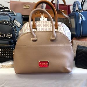 BEBE JENNA MED PEBBLE DOME BLUSH COLOR BRAND NEW